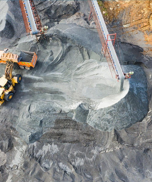 An aerial view of a construction site with trucks